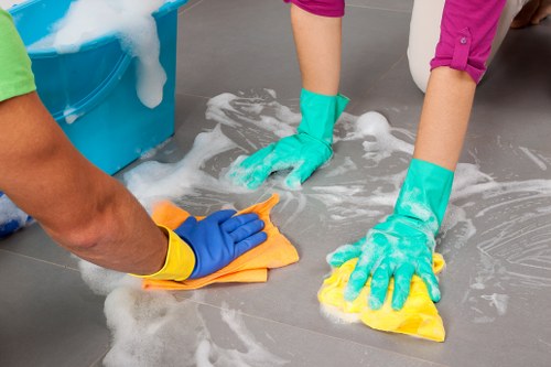 Cleaner in Edgware checking a room before starting work