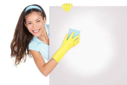 Deep cleaning of kitchen surfaces and cupboards before moving in